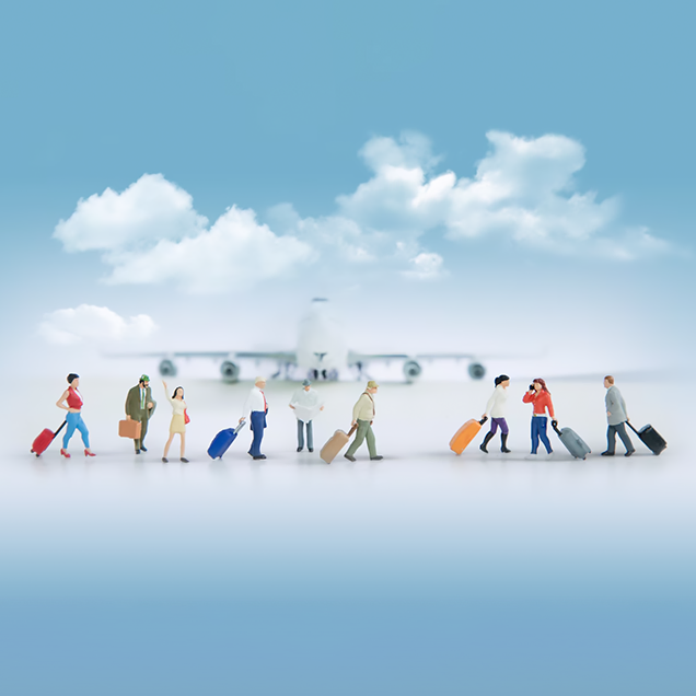 Travelers with luggage heading to airplane assisted by trusted Migration service providers in Kerala